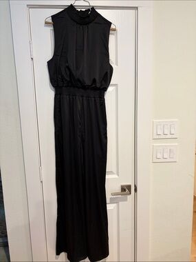 Classic Black Sleeveless Jumpsuit with Smocked Waist